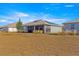 Backyard featuring a screened lanai, landscaping, and a well-maintained lawn at 10589 Sw 98Th Ln, Ocala, FL 34481
