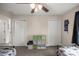Bedroom featuring two twin beds with decorative bedding and closet with white doors at 1081 Se 170Th Ave, Silver Springs, FL 34488