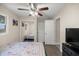 Bedroom featuring a bed, natural light, and hardwood flooring at 1081 Se 170Th Ave, Silver Springs, FL 34488