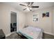 Bedroom featuring a bed, natural light, and hardwood flooring at 1081 Se 170Th Ave, Silver Springs, FL 34488