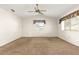 Large bedroom with carpet and lots of natural light at 10833 Sw 86Th Ter, Ocala, FL 34481