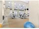 Community gym with exercise machines and free weights for a comprehensive fitness center experience at 10833 Sw 86Th Ter, Ocala, FL 34481