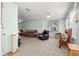 Open living room with bright paint and natural light, ideal for relaxation and social gatherings at 10989 Sw 86Th Ave, Ocala, FL 34481