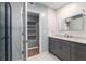 Bathroom featuring a vanity with granite top, shower and tub at 11065 Ne 42Nd St, Silver Springs, FL 34488