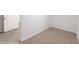 Bedroom featuring neutral carpet and white walls at 11065 Ne 42Nd St, Silver Springs, FL 34488