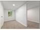 Bedroom featuring neutral carpet and white walls at 11065 Ne 42Nd St, Silver Springs, FL 34488