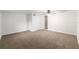 Large bedroom with carpet, closet, and neutral walls at 11065 Ne 42Nd St, Silver Springs, FL 34488