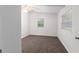Bedroom with neutral carpet and one window at 11065 Ne 42Nd St, Silver Springs, FL 34488