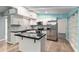 A stunning modern kitchen with stainless appliances and plenty of storage at 11065 Ne 42Nd St, Silver Springs, FL 34488
