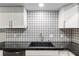 The kitchen features granite countertops and a stylish backsplash at 11065 Ne 42Nd St, Silver Springs, FL 34488