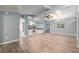 Open concept living room with vaulted ceiling and access to the kitchen at 11065 Ne 42Nd St, Silver Springs, FL 34488