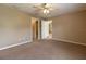 Spacious bedroom with neutral carpet and paint at 13645 Se 42 Ave, Summerfield, FL 34491