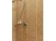 Close up of a tiled shower with a showerhead at 13645 Se 42 Ave, Summerfield, FL 34491
