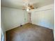 Well-lit bedroom offering carpeted floors and closet space, creating a cozy atmosphere at 15069 Se 73Rd Ave, Summerfield, FL 34491