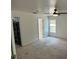 Bright bedroom with neutral carpet, ceiling fan and natural light at 15069 Se 73Rd Ave, Summerfield, FL 34491