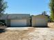 Spacious two-car garage and an additional outbuilding offering ample storage and parking on the property at 15069 Se 73Rd Ave, Summerfield, FL 34491