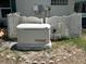 Backyard generator with white privacy lattice at 15069 Se 73Rd Ave, Summerfield, FL 34491