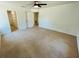 Spacious main bedroom features a large closet and ensuite access for added convenience at 15069 Se 73Rd Ave, Summerfield, FL 34491