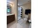 Well-lit bathroom with a walk-in shower, vanity, and toilet at 15976 Sw 23Rd Court Rd, Ocala, FL 34473