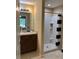 Bathroom featuring a single sink vanity, toilet and walk-in shower at 15976 Sw 23Rd Court Rd, Ocala, FL 34473