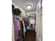 Walk-in closet with hanging rods, shelving, and ample storage space at 15976 Sw 23Rd Court Rd, Ocala, FL 34473