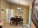 Cozy dining area adjacent to the kitchen with a view of the backyard at 15976 Sw 23Rd Court Rd, Ocala, FL 34473