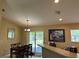 Bright dining area with sliding glass doors and a view of the outdoors at 15976 Sw 23Rd Court Rd, Ocala, FL 34473