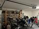 Garage interior with overhead storage and parked motorcycles at 15976 Sw 23Rd Court Rd, Ocala, FL 34473