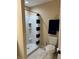Shower area including toilet and towel rack in naturally lit bathroom at 15976 Sw 23Rd Court Rd, Ocala, FL 34473