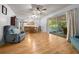 Open-concept living and dining area with access to the patio at 16571 Se 95Th Street Rd, Ocklawaha, FL 32179