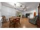 Spacious living area with dining and lounge space, sliding glass doors at 16571 Se 95Th Street Rd, Ocklawaha, FL 32179