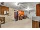 Spacious basement area featuring concrete floors and walls plus storage, workbench, and utility access at 16891 Ne 243Rd Place Rd, Fort Mc Coy, FL 32134