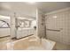 Bright bathroom with a large bathtub, dual sinks and a tiled shower at 16891 Ne 243Rd Place Rd, Fort Mc Coy, FL 32134
