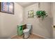 Bathroom features a commode and vanity with sink at 16891 Ne 243Rd Place Rd, Fort Mc Coy, FL 32134
