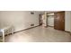Spacious bedroom featuring tile flooring, ample space, and a closet for storage at 16891 Ne 243Rd Place Rd, Fort Mc Coy, FL 32134