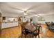 Spacious dining room with tile floors, ceiling fans and views of the adjoining rooms at 16891 Ne 243Rd Place Rd, Fort Mc Coy, FL 32134
