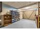 Storage is plentiful in this garage with many shelves and rolling garage door at 16891 Ne 243Rd Place Rd, Fort Mc Coy, FL 32134