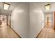 Hallway with tile flooring and neutral wall paint at 16891 Ne 243Rd Place Rd, Fort Mc Coy, FL 32134