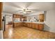 Kitchen area featuring wood cabinets, lots of counter space and an open design at 16891 Ne 243Rd Place Rd, Fort Mc Coy, FL 32134
