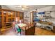 Office boasts wood cabinetry, built-in shelves, and ample workspace at 16891 Ne 243Rd Place Rd, Fort Mc Coy, FL 32134
