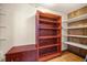 Shelving is included in the room which has tile floors at 16891 Ne 243Rd Place Rd, Fort Mc Coy, FL 32134