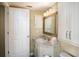 Well-lit bathroom featuring a vanity with countertop and ample cabinet space at 20800 River Dr # A11, Dunnellon, FL 34431
