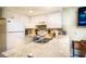 Efficient kitchen with white cabinets, counter seating, and modern appliances, ready for cooking at 20800 River Dr # A11, Dunnellon, FL 34431