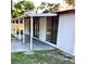 View of covered back porch with multiple sliding glass doors to the home's interior at 2138 Sw 9Th Rd, Ocala, FL 34471