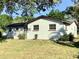 Charming single-story home featuring a cozy front porch and well-maintained landscaping in a serene neighborhood at 2138 Sw 9Th Rd, Ocala, FL 34471