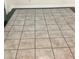 Close-up of the kitchen floor, featuring neutral ceramic tile at 2138 Sw 9Th Rd, Ocala, FL 34471