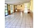 Bright living room featuring ceramic tile flooring and natural lighting at 2138 Sw 9Th Rd, Ocala, FL 34471