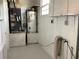 Utility room with water heater and furnace, offering functionality and storage at 2138 Sw 9Th Rd, Ocala, FL 34471