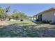 Expansive backyard features a pool, patio area, and lush green lawn for outdoor enjoyment at 2808 Ne 24Th Ct, Ocala, FL 34470