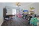 Spacious bedroom features a ceiling fan, window, and plenty of space for activities at 2808 Ne 24Th Ct, Ocala, FL 34470